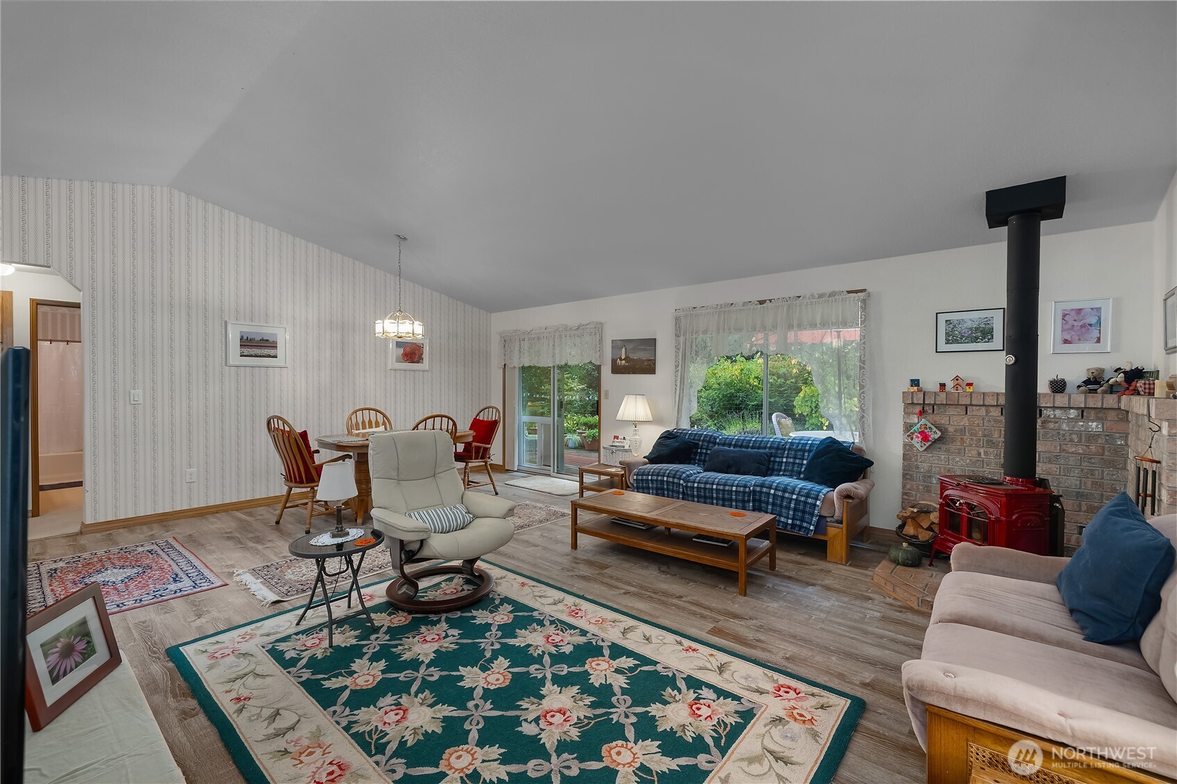 5505 Oyster Bay Road Northwest Olympia, WA 98502 - Photo 3 of 40 a living room with furniture and a rug