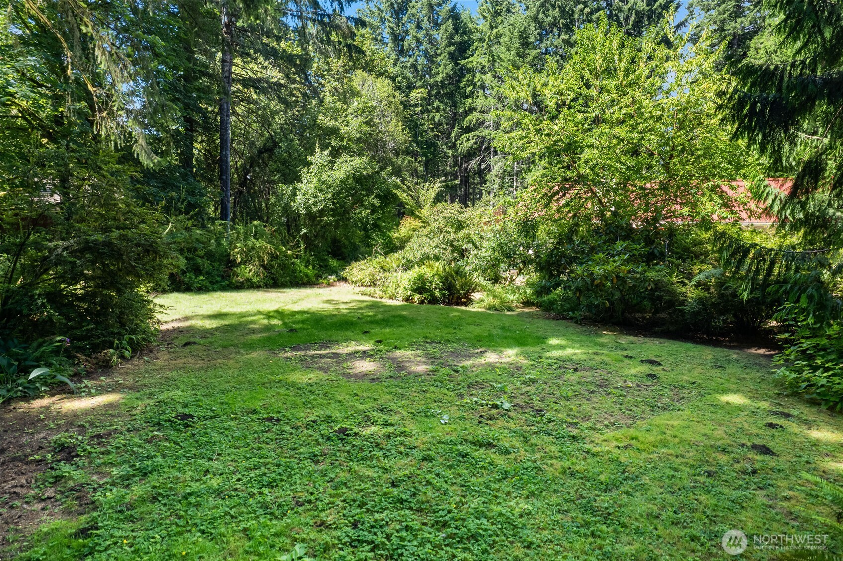 5505 Oyster Bay Road Northwest Olympia, WA 98502 - Photo 39 of 40 a view of yard with green space