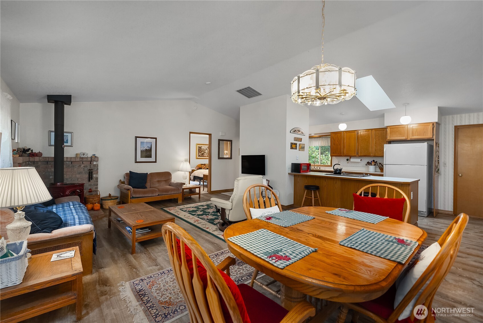 5505 Oyster Bay Road Northwest Olympia, WA 98502 - Photo 6 of 40 a outdoor space with furniture and chandelier