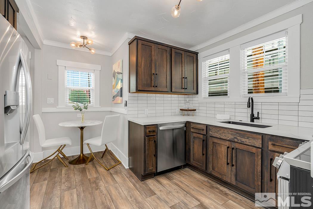 215 East Liberty Street Reno, NV 89501 - Photo 14 of 20 a kitchen with a sink cabinets and window