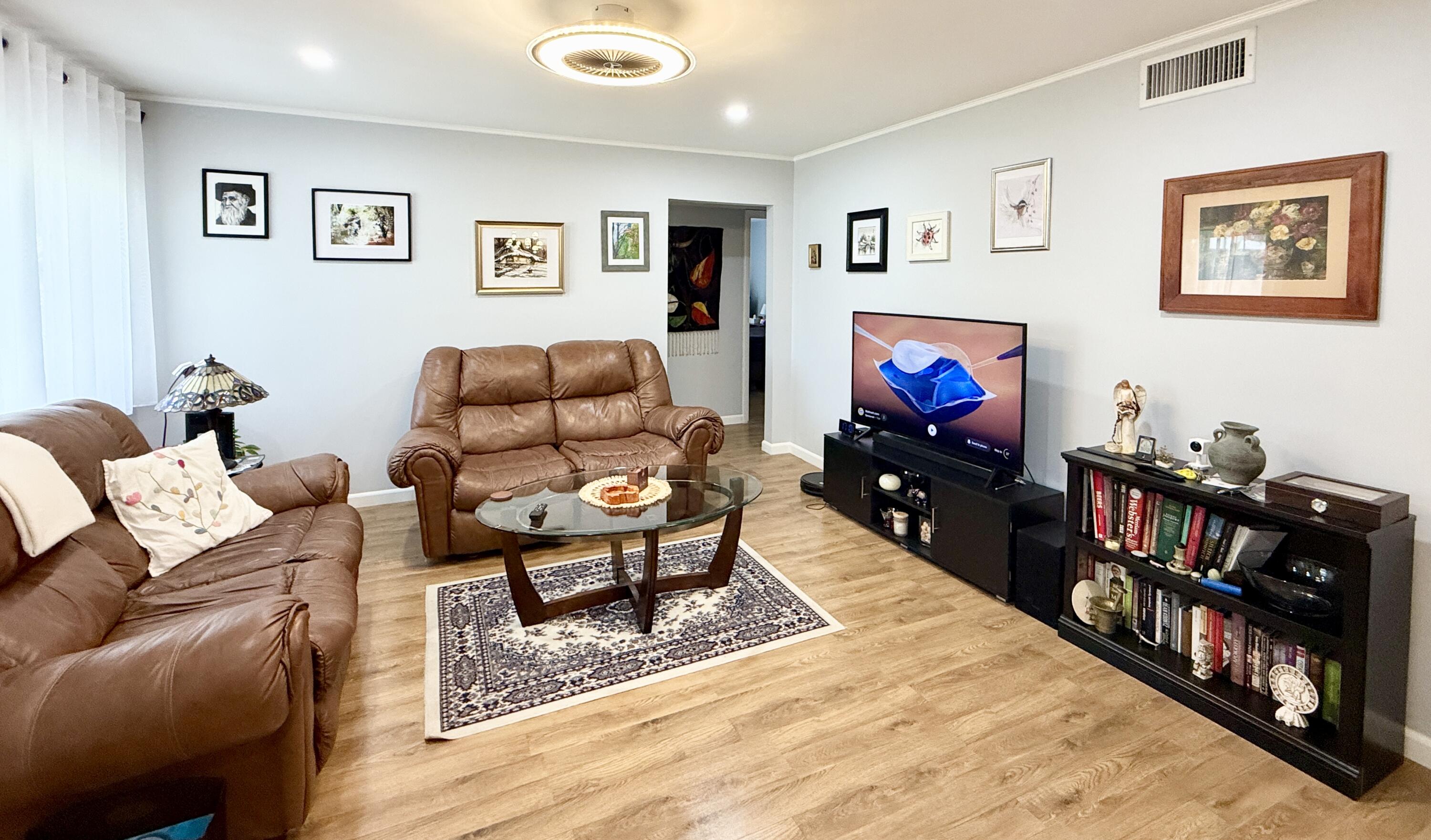 301 Pine Ridge Circle, Unit C2 Greenacres, FL 33463 - Photo 5 of 28 Living room