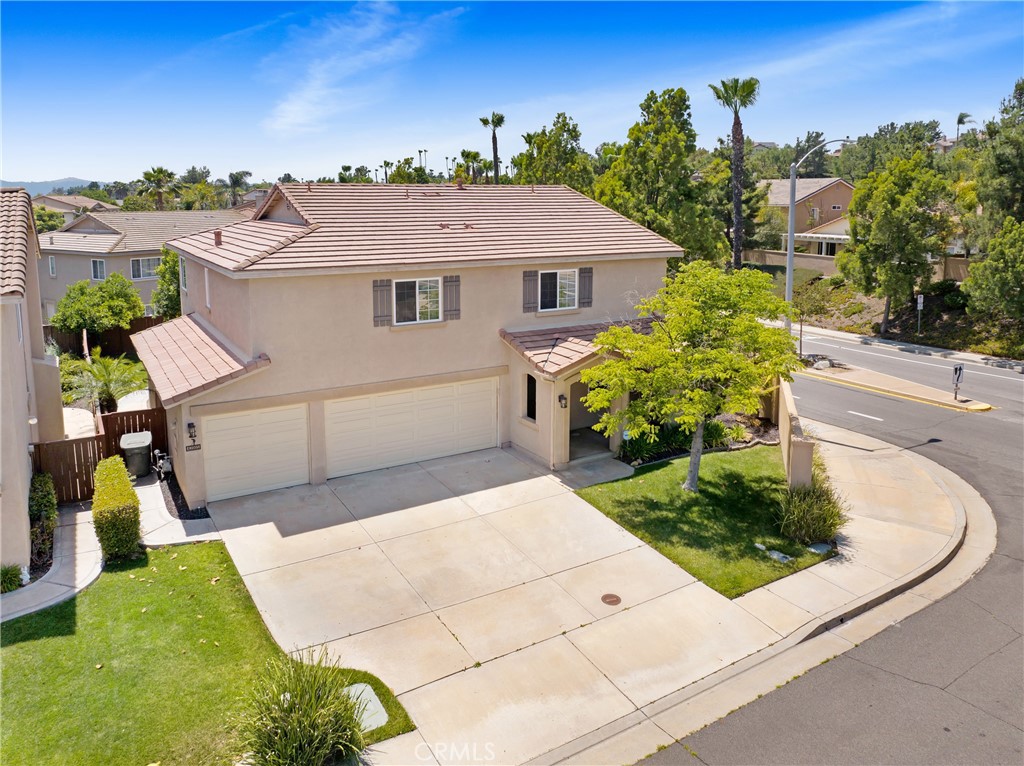 42005 Pine Needle Street Temecula, CA 92591 - Photo 1 of 45 Elevated view of front of the house. Lots of driveway space!