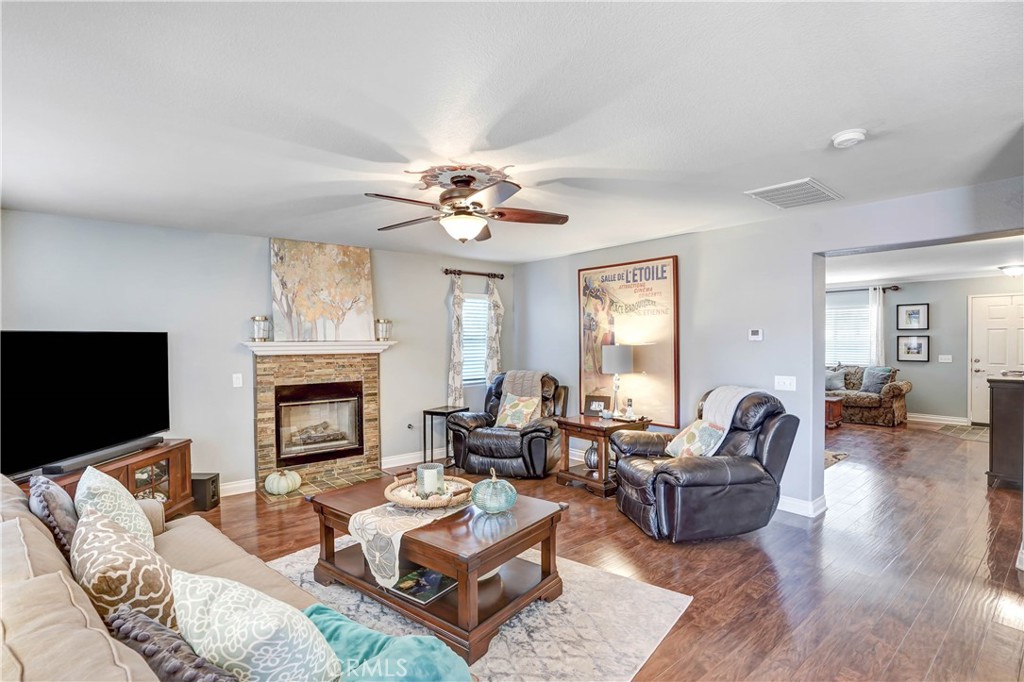 42005 Pine Needle Street Temecula, CA 92591 - Photo 11 of 45 Family Room Fireplace area as staged by previous tenant.