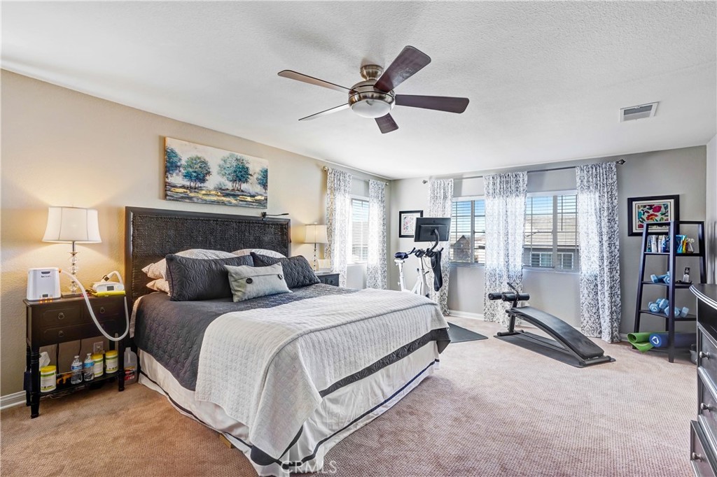 42005 Pine Needle Street Temecula, CA 92591 - Photo 24 of 45 Primary Bedroom as staged by previous tenant.