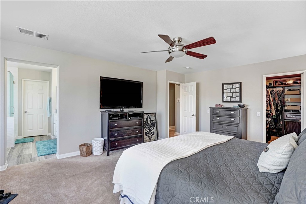 42005 Pine Needle Street Temecula, CA 92591 - Photo 25 of 45 Alternate view of the primary bedroom as staged by previous tenant.
