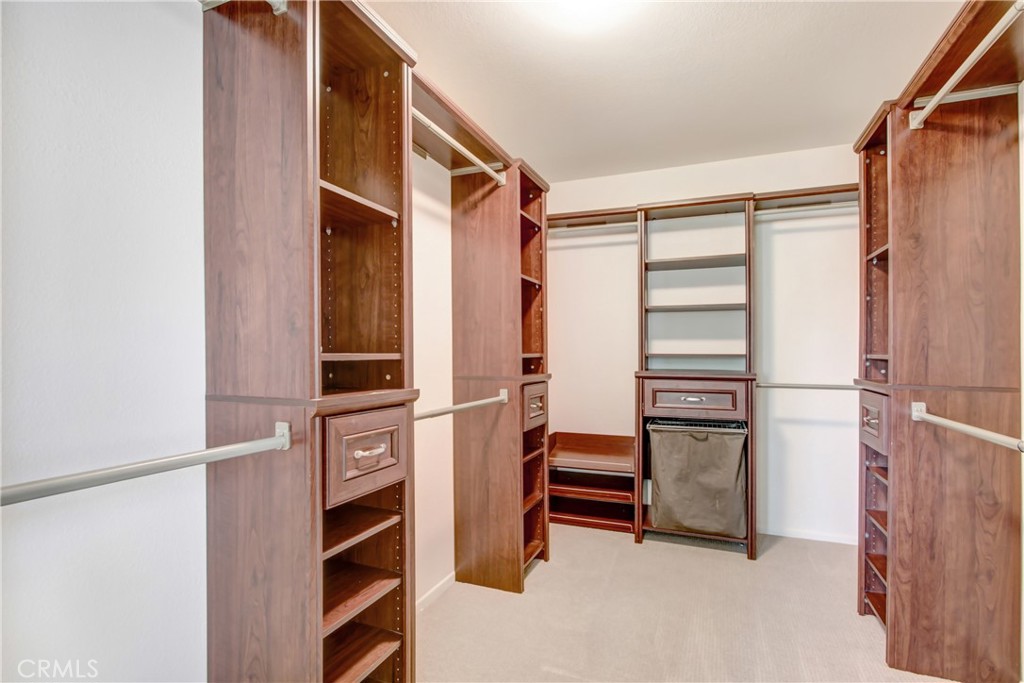 42005 Pine Needle Street Temecula, CA 92591 - Photo 26 of 45 The custom primary bedroom walk-in closet.