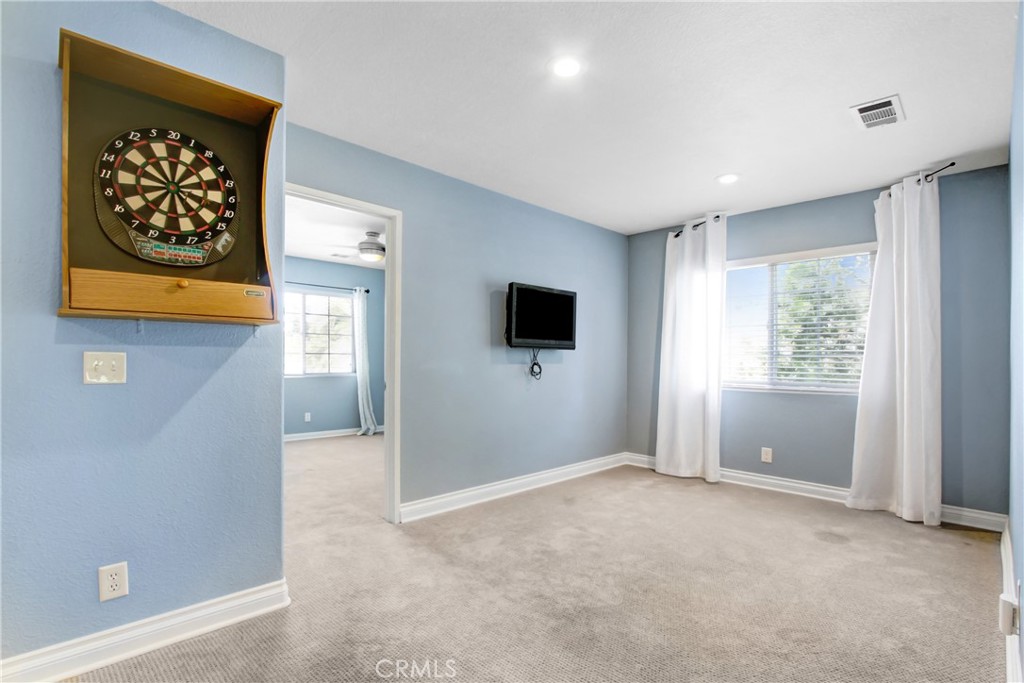 42005 Pine Needle Street Temecula, CA 92591 - Photo 29 of 45 The upstairs loft, electronic dartboard included!