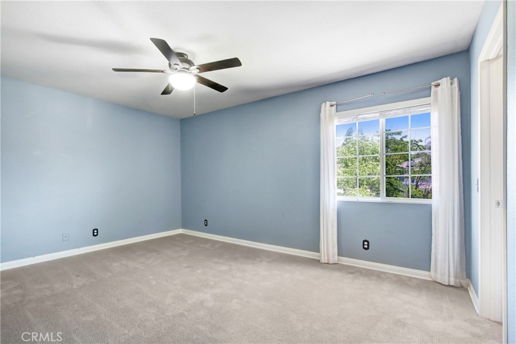 42005 Pine Needle Street Temecula, CA 92591 - Photo 33 of 45 Bedroom #3 is large and has a walk-in closet.