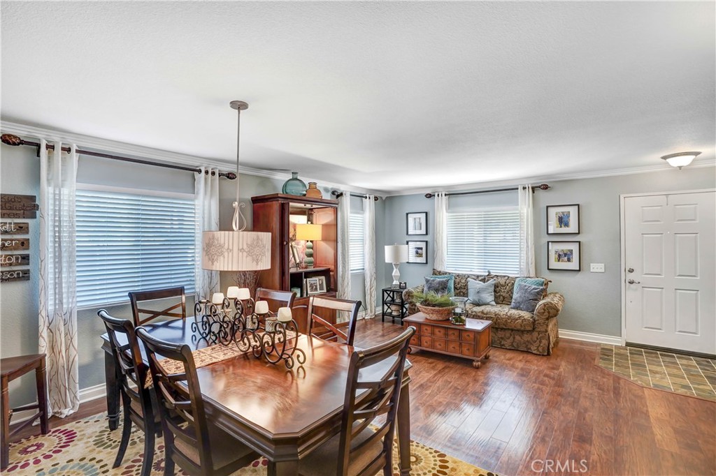 42005 Pine Needle Street Temecula, CA 92591 - Photo 6 of 45 The living room and dining room as staged by the previous tenant.