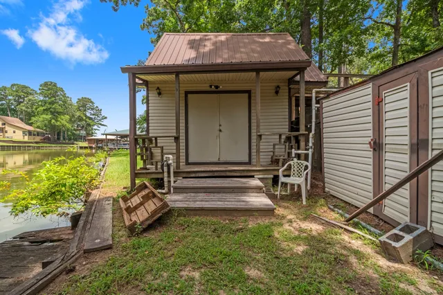 a view of a chairs and table in the patio