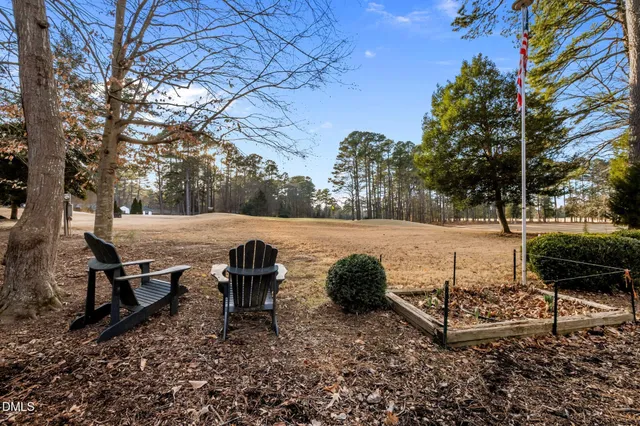 a kitchen with a refrigerator and a stove