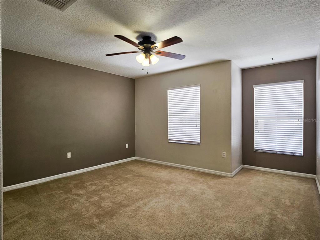 5383 Quarry Rock Road Lakeland, FL 33809 - Photo 15 of 23 a view of an empty room with a window