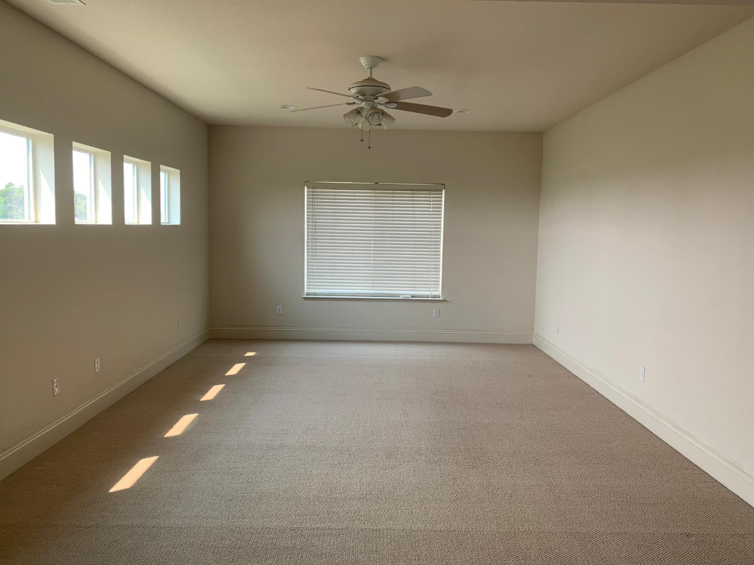 16160 Moore Road Lodi, CA 95242 - Photo 15 of 38 a view of an empty room with a window