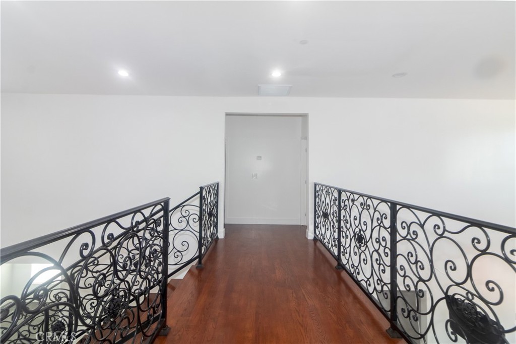 17423 Wicker Way Riverside, CA 92504 - Photo 23 of 66 a view of hallway with wooden floor