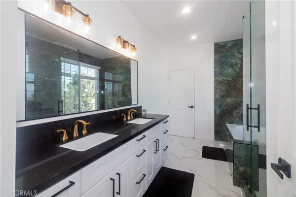 a bathroom with a sink and a toilet