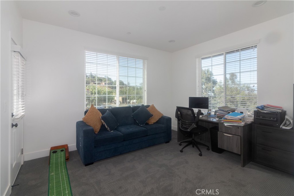 17423 Wicker Way Riverside, CA 92504 - Photo 28 of 66 a living room with furniture and a window