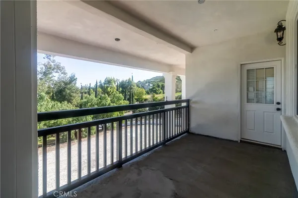 a view of a backyard of the house