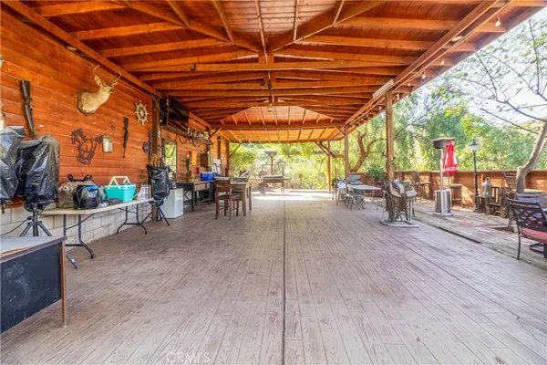 a view of a room with furniture and a yard