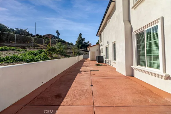 a view of a terrace with yard