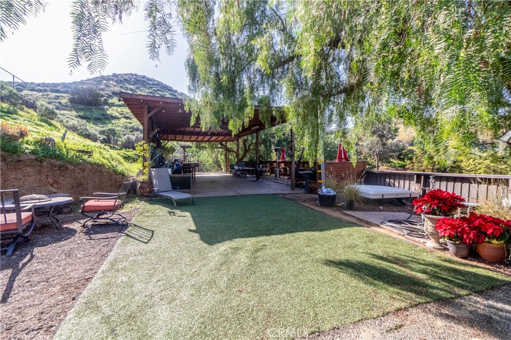17423 Wicker Way Riverside, CA 92504 - Photo 45 of 66 a view of a backyard with sitting area