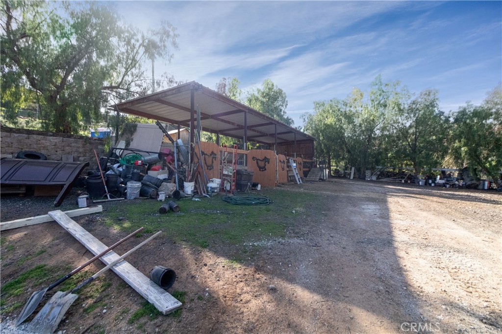 17423 Wicker Way Riverside, CA 92504 - Photo 48 of 66 a view of a patio with furniture and a yard