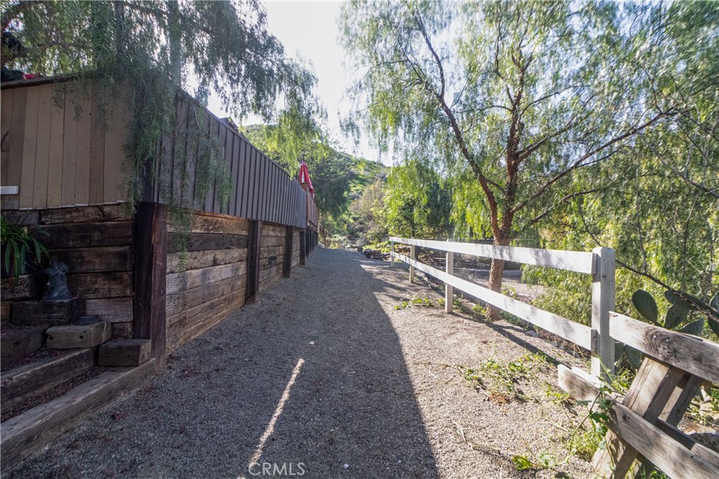 17423 Wicker Way Riverside, CA 92504 - Photo 50 of 66 a view of balcony with wooden floor and fence