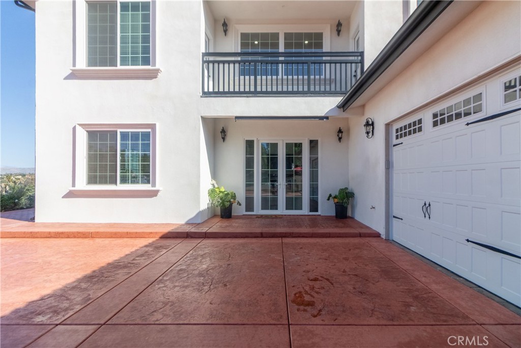 17423 Wicker Way Riverside, CA 92504 - Photo 6 of 66 a front view of a house with porch