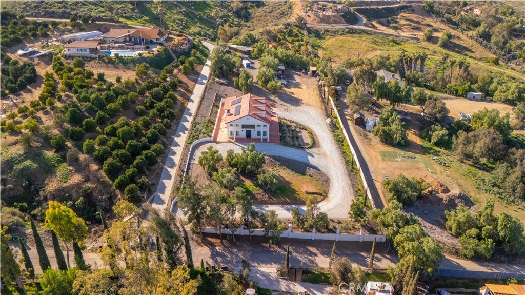 17423 Wicker Way Riverside, CA 92504 - Photo 65 of 66 an aerial view of residential houses with outdoor space