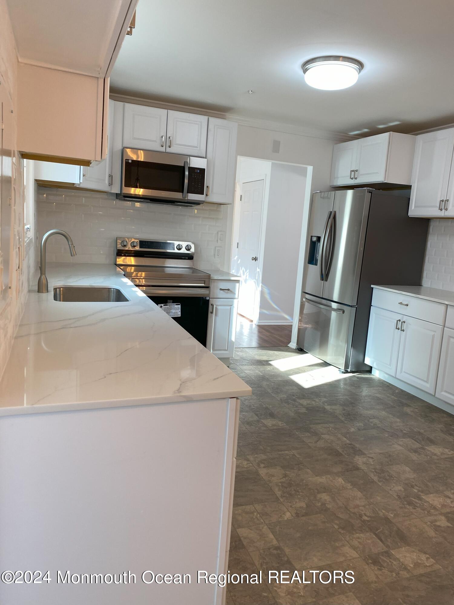 11 A Zacatin Road, Unit 1000 Freehold, NJ 07728 - Photo 6 of 26 IMG_9421