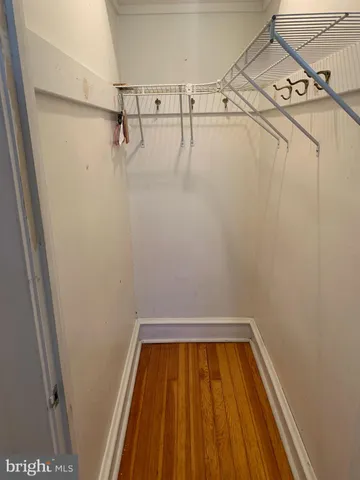 a view of a room with racks on the wall