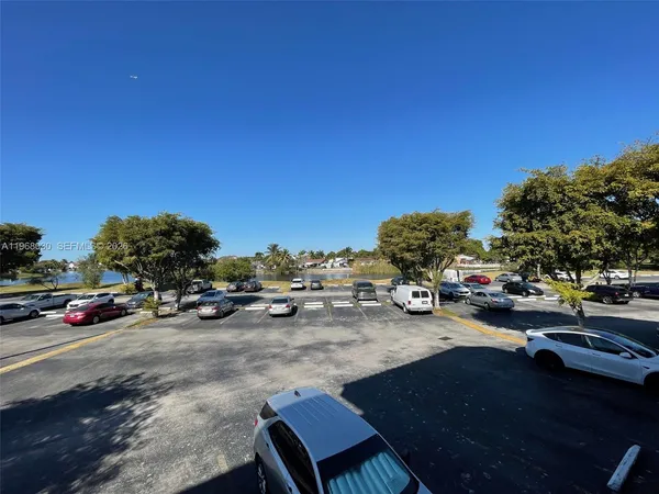 a view of a street with cars