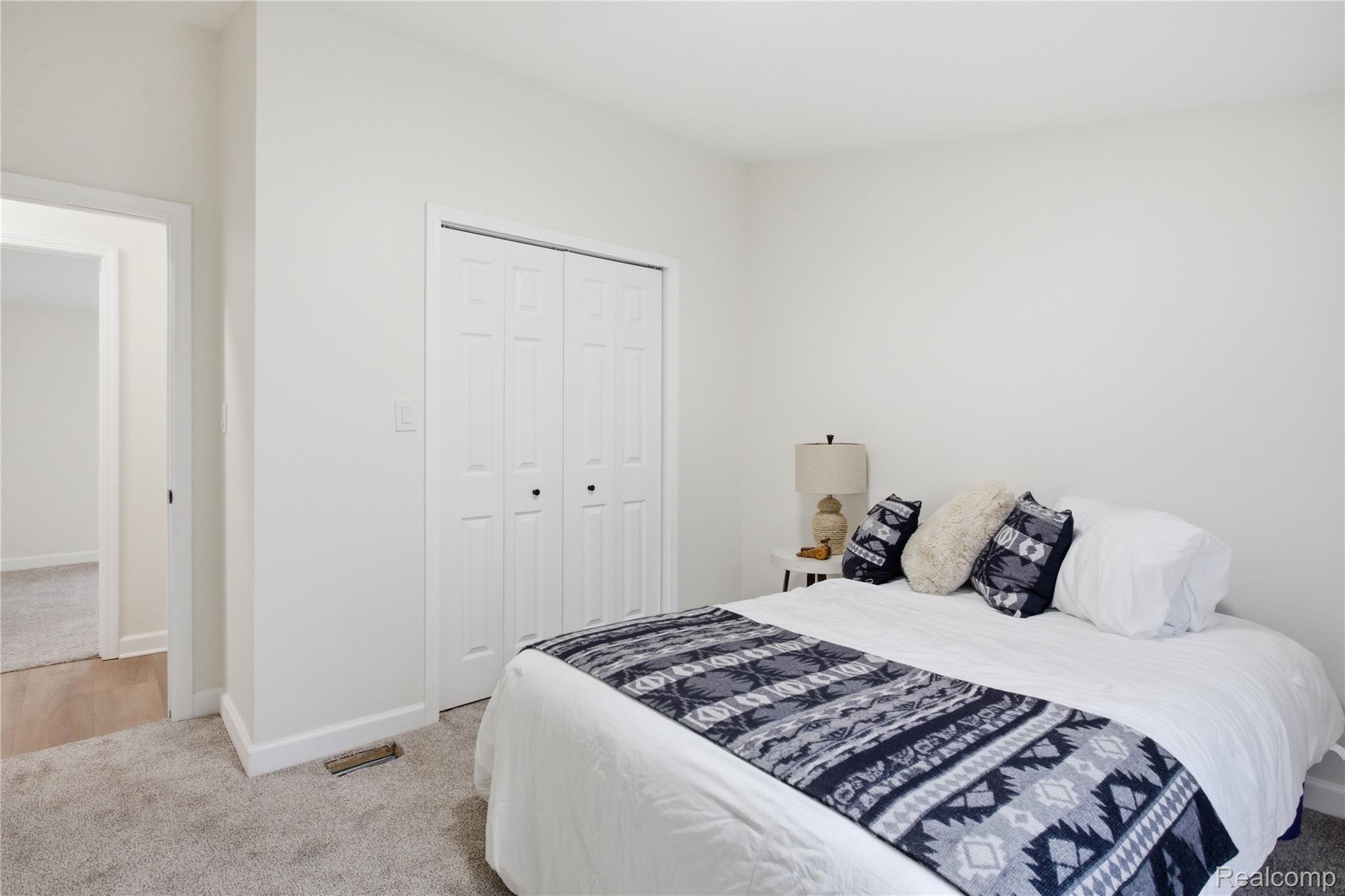 5350 List Road Grass Lake, MI 49240 - Photo 31 of 71 Bedroom with light carpet and a closet