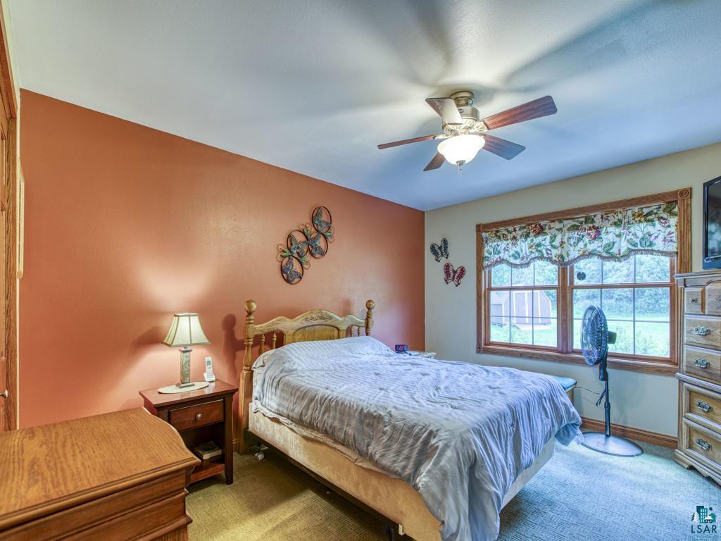 4678 Ridgeview Drive Superior, WI 54880 - Photo 17 of 43 Carpeted bedroom with ceiling fan