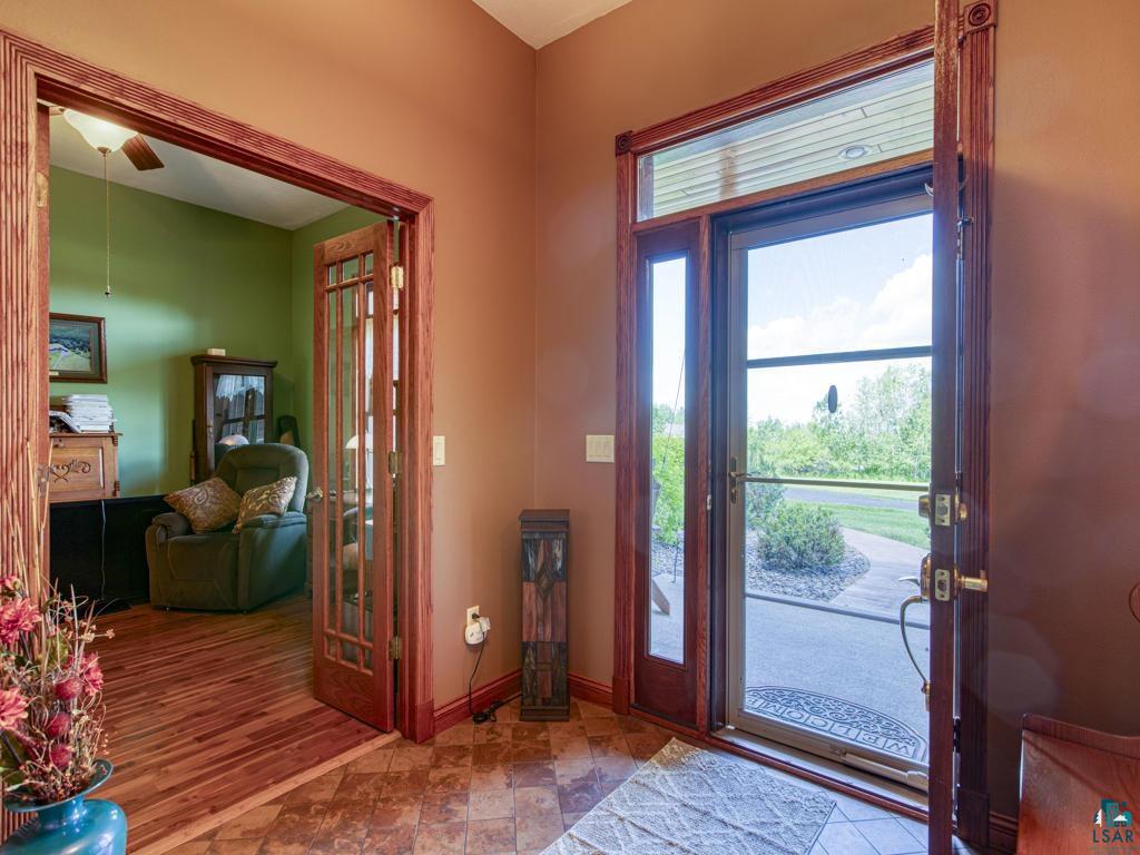 4678 Ridgeview Drive Superior, WI 54880 - Photo 25 of 43 Entrance foyer featuring wood-type flooring and ceiling fan