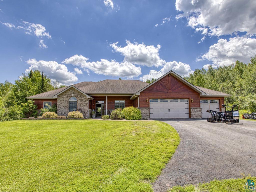 4678 Ridgeview Drive Superior, WI 54880 - Photo 43 of 43 View of front of property with a garage and a front yard