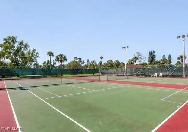 a view of an outdoor space and tennis court
