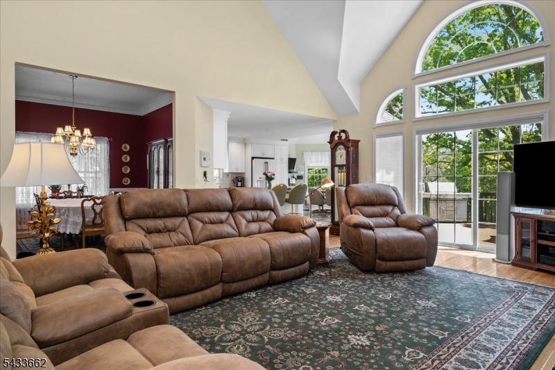 15 Bracken Hill Road Hamburg, NJ 07419 - Photo 8 of 44 a living room with furniture and a large window