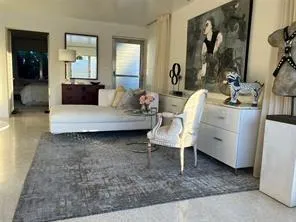 a house view with a garden space