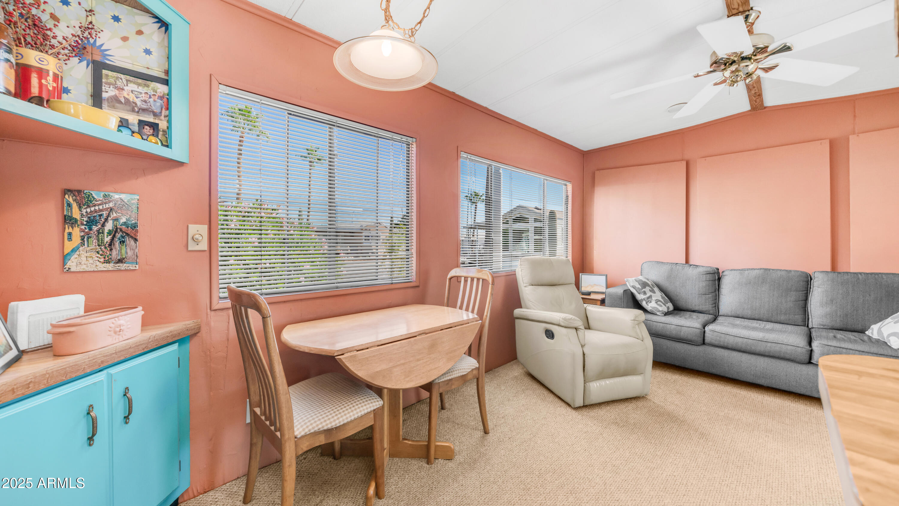 502 Jaspar Drive Apache Junction, AZ 85119 - Photo 13 of 54 a living room with furniture and a large window
