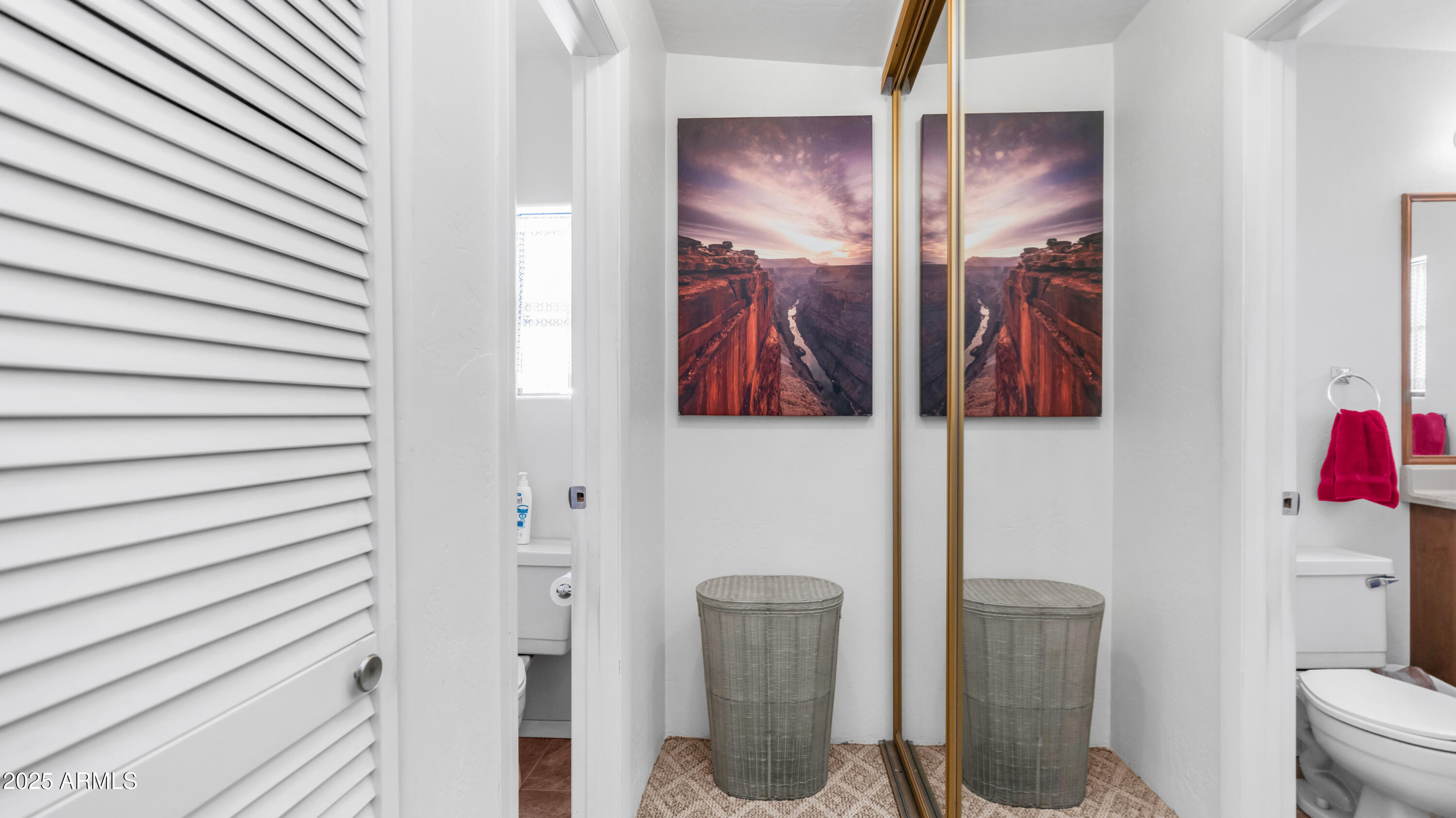 502 Jaspar Drive Apache Junction, AZ 85119 - Photo 18 of 54 a bathroom with a toilet and a shower curtain