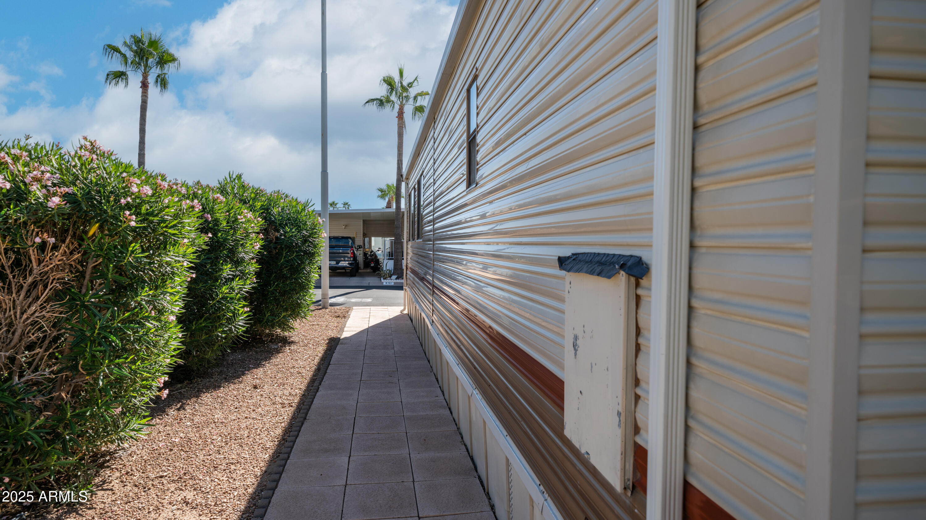 502 Jaspar Drive Apache Junction, AZ 85119 - Photo 25 of 54 a view of a pathway of a house