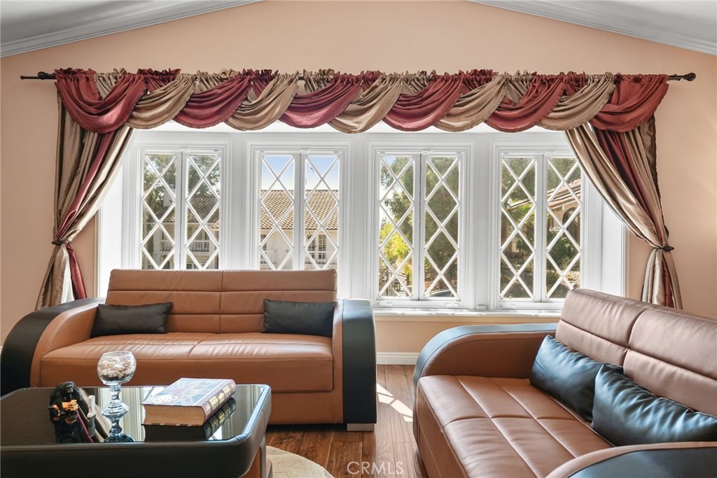 19317 Vista Grande Way Porter Ranch, CA 91326 - Photo 25 of 53 a living room with furniture and a window
