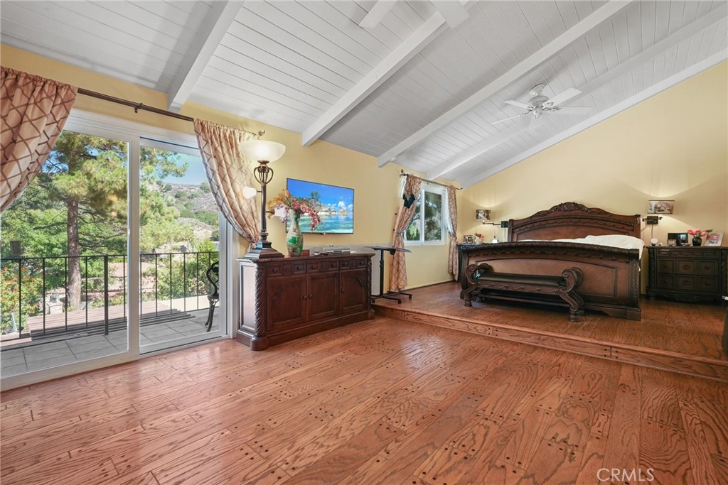 19317 Vista Grande Way Porter Ranch, CA 91326 - Photo 28 of 53 a car parked in a room next to a window