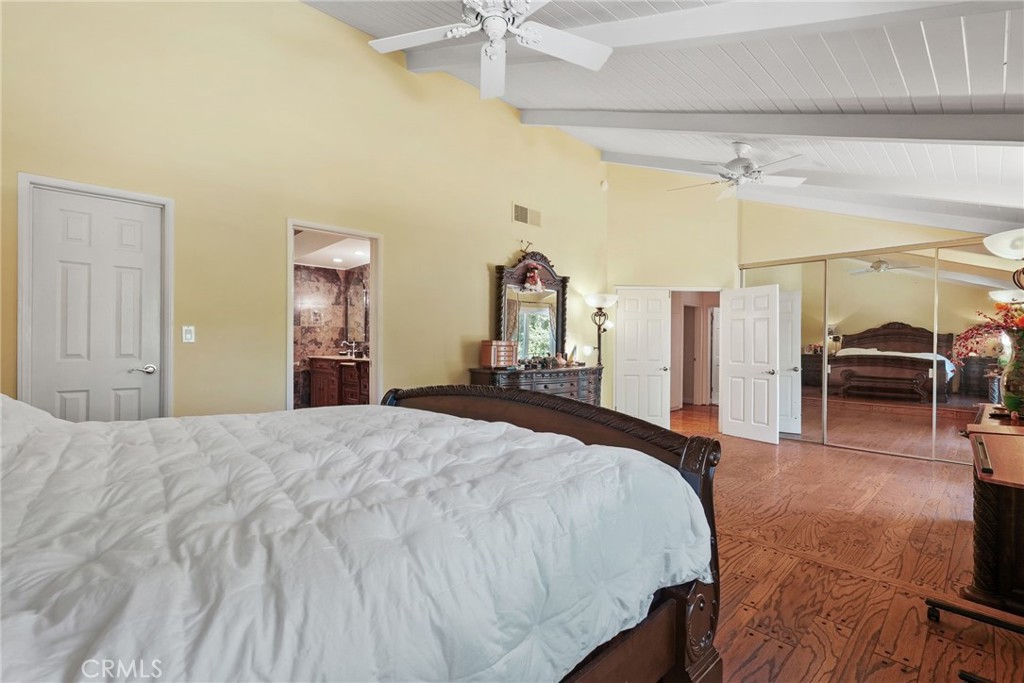 19317 Vista Grande Way Porter Ranch, CA 91326 - Photo 29 of 53 a bed room with a bed and a chair