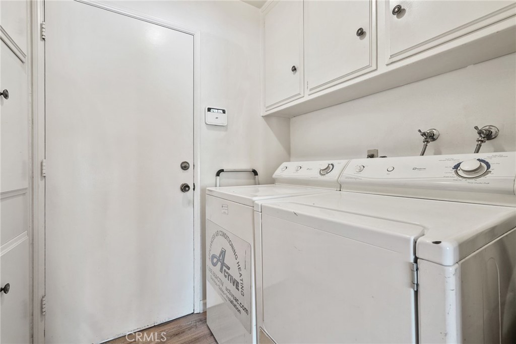 19317 Vista Grande Way Porter Ranch, CA 91326 - Photo 34 of 53 a utility room with dryer and washer