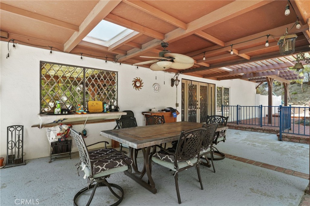 19317 Vista Grande Way Porter Ranch, CA 91326 - Photo 39 of 53 a view of an outside dining space with furniture