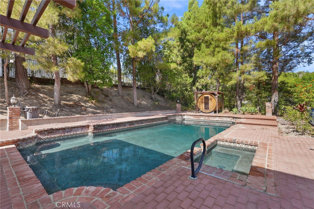 19317 Vista Grande Way Porter Ranch, CA 91326 - Photo 40 of 53 a view of a yard with a bench