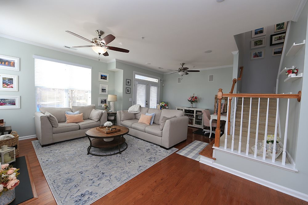 9145 Wooden Road Raleigh, NC 27617 - Photo 4 of 16 Double doors lead out to screened in porch. Family Room