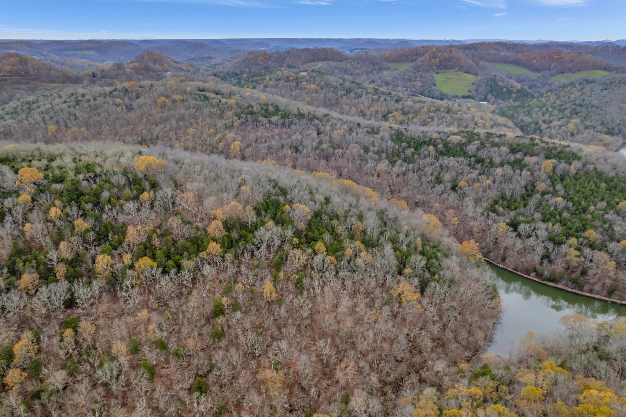 0 Huff Hollow Road Granville, TN 38564 - Photo 6 of 39 a view of a lake with mountains in the background