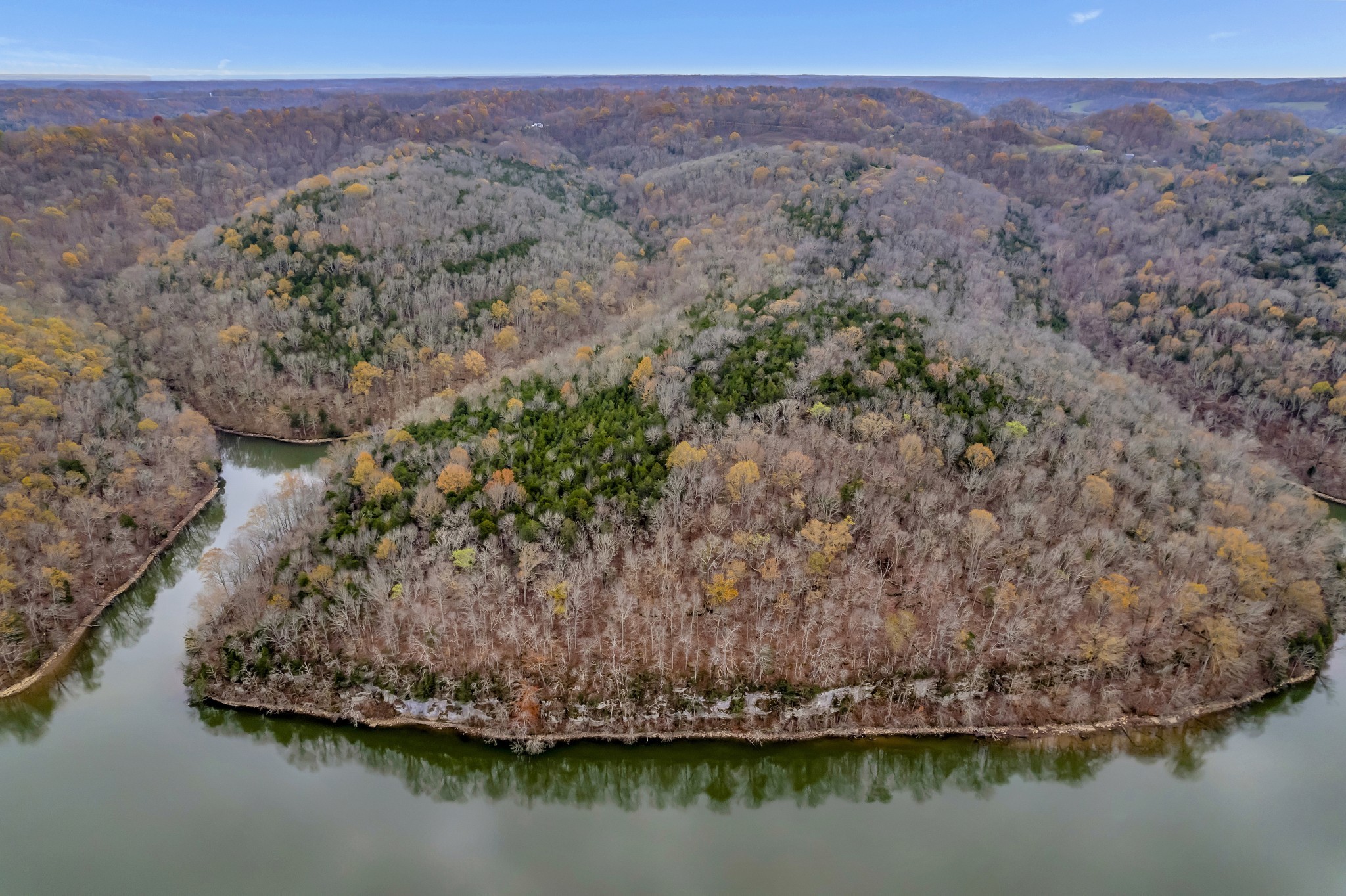 0 Huff Hollow Road Granville, TN 38564 - Photo 7 of 39 a view of a lake with mountains in the background